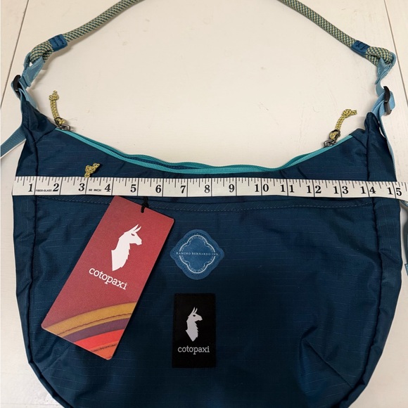 Cotopaxi Navy Crossbody Bag with Teal Accents - Picture 5 of 5